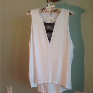 NWT CHICHI 
JERSEY HI-LOW BLOUSE